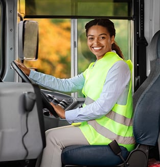 Lady driving a bus