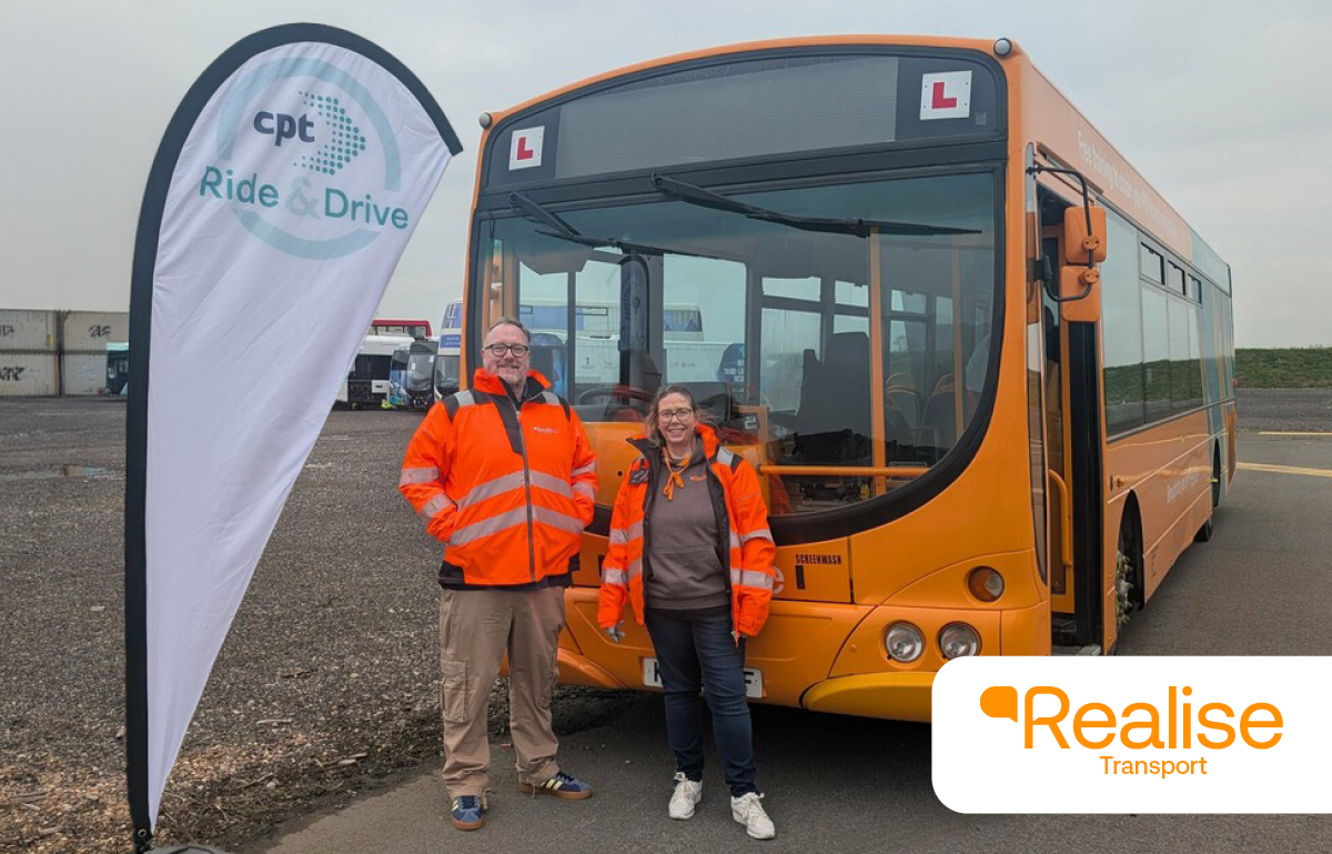 man and woman with bus