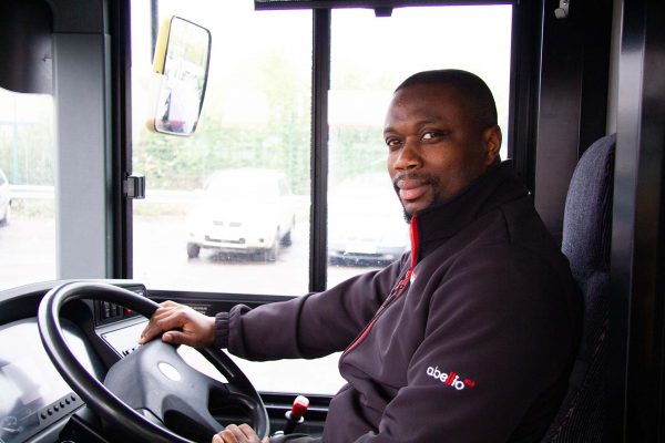 Man driving a bus